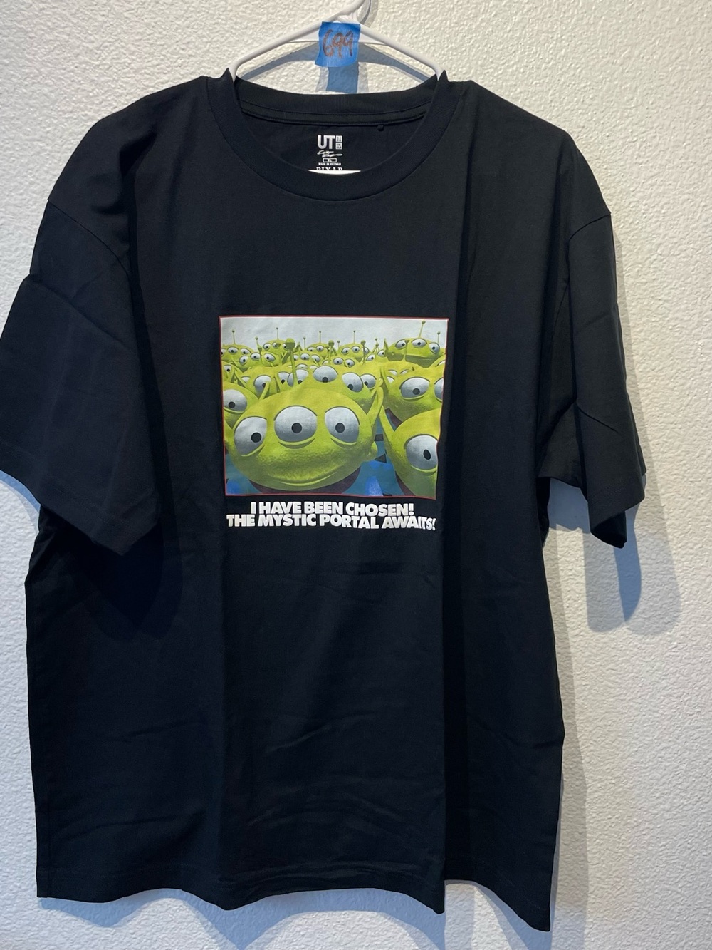Uniqlo Black Short-Sleeve Graphic Tee with Green Alien Print
